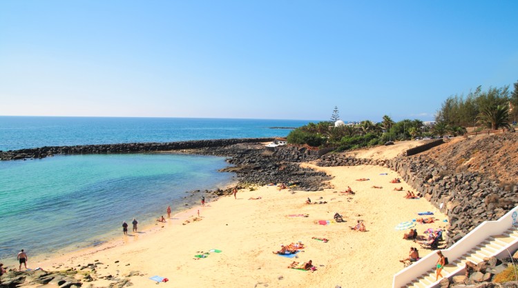 Tourists on a beach in the Canary Islands